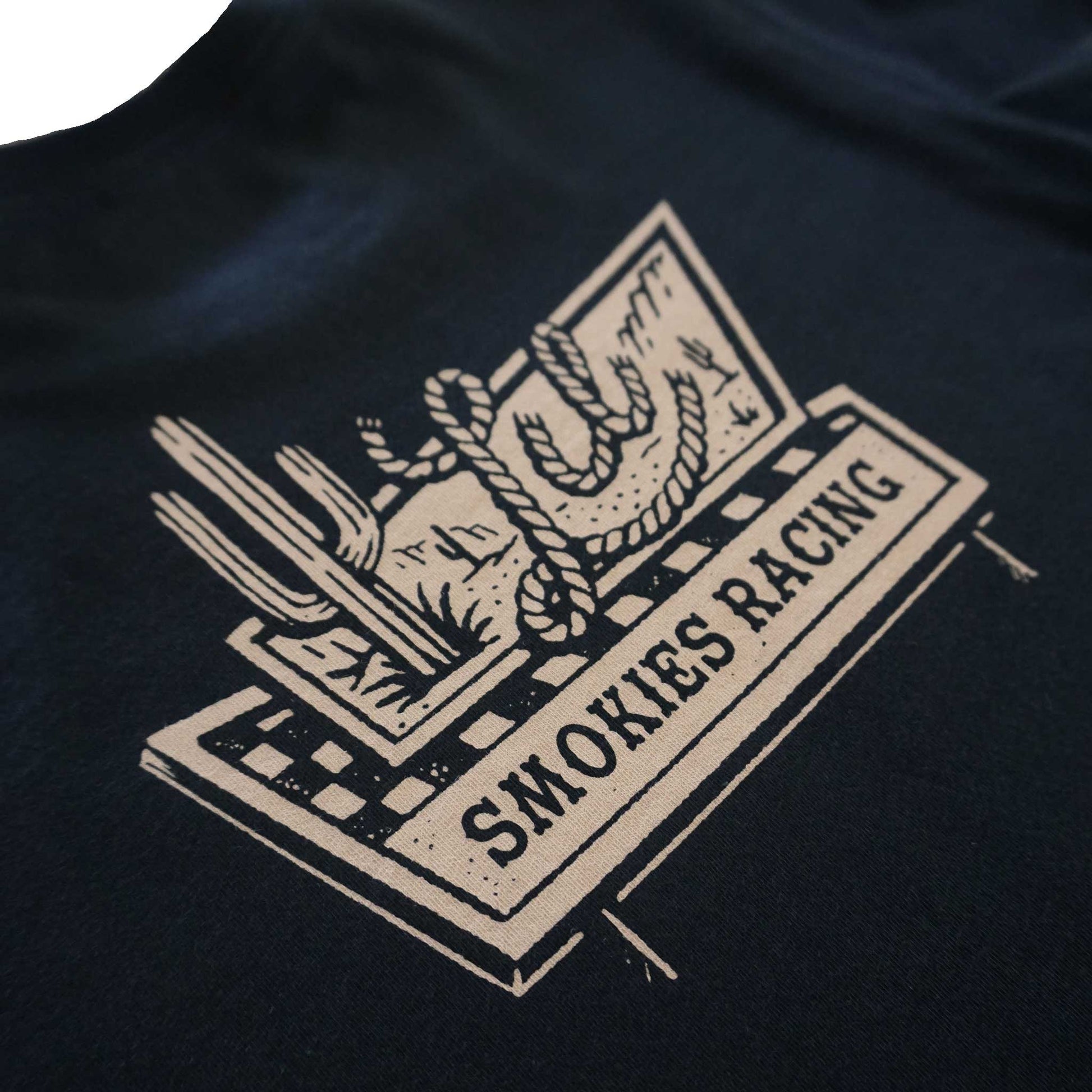 Close detailed shot of the Lil Smokies road sign graphic. Cactus and rope lettering detail with a southwestern look.