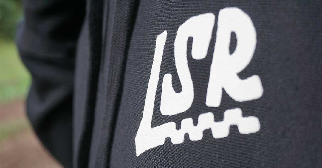 Moto gear for dirt bike riders and racers. This adult hoody features high quality outerwear construction. Graphic on front and back of apparel. LSR branded garment.