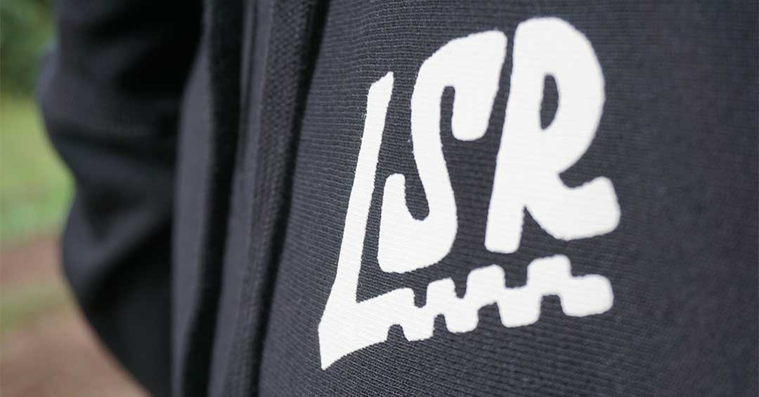 Moto gear for dirt bike riders and racers. This adult hoody features high quality outerwear construction. Graphic on front and back of apparel. LSR branded garment. 