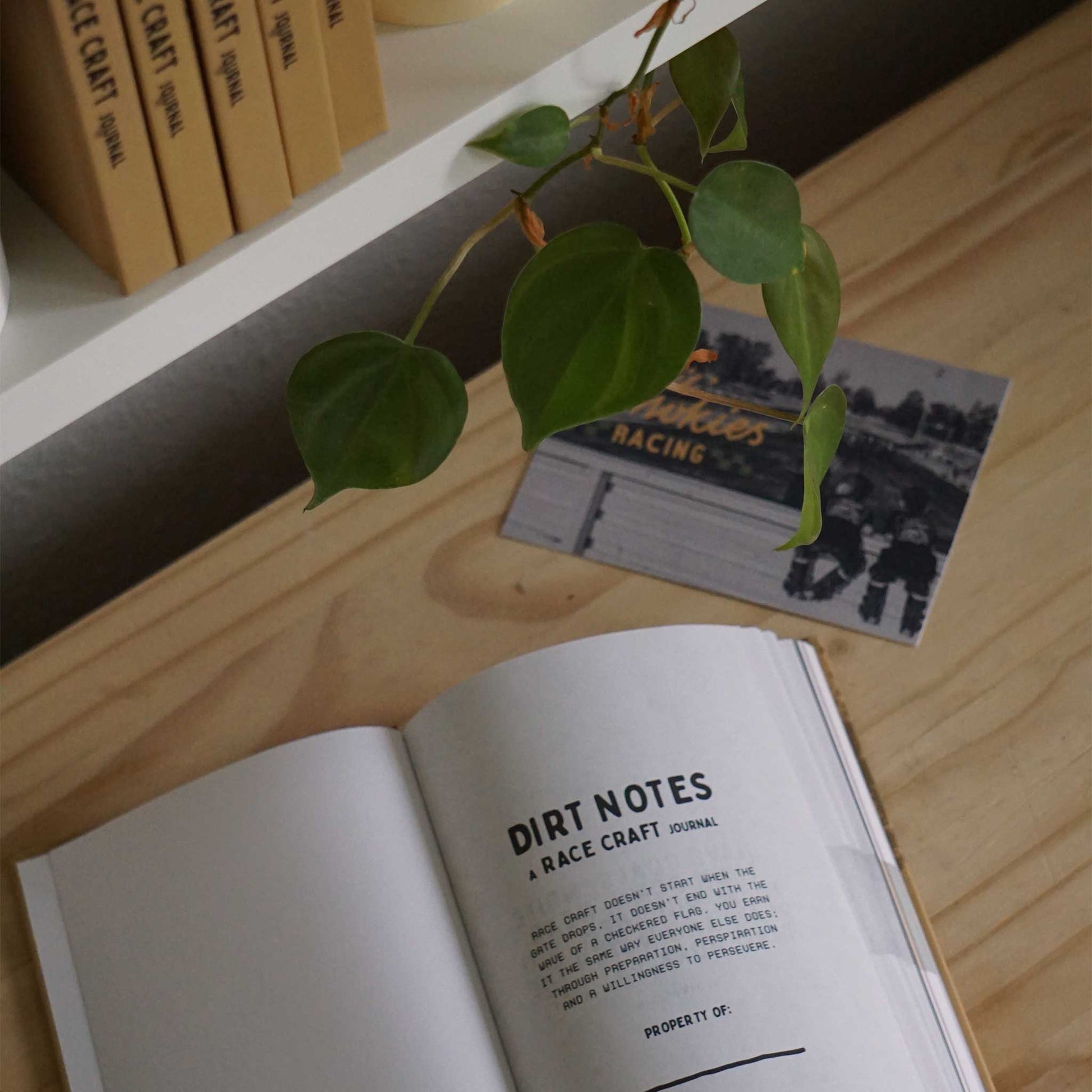 Rev up your organization game with this motocross-themed planner journal, featuring a striking dirt bike design. Perfect for dirt bike aficionados planning race schedules, track maintenance, and gear checklists. Grab yours now and streamline your motocross journey! Dirt Notes, a race craft journal.
