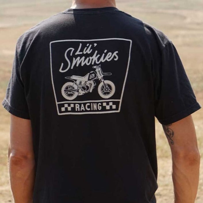 Motocross gear for dirtbike racing. Back graphic of dirt bike. available for motocross youth and adult. on body image of an adult wearing Black adult shortsleeve tee with Lil Smokies Racing font logo. Original Lil Smokies Racing design of a 50cc dirtbike with custom LSR graphic and number 1 plate.