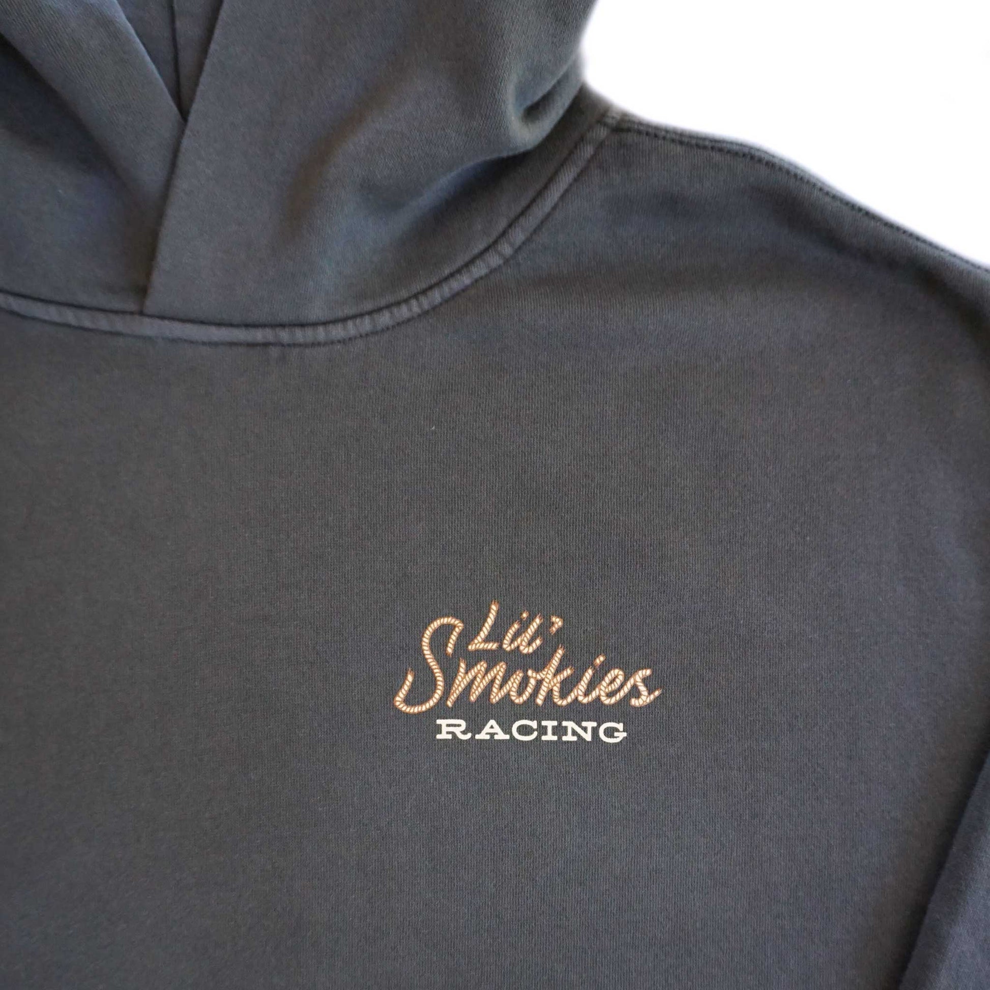 Close up image of the left front chest Lil Smokies Racing logo with western rope lettering