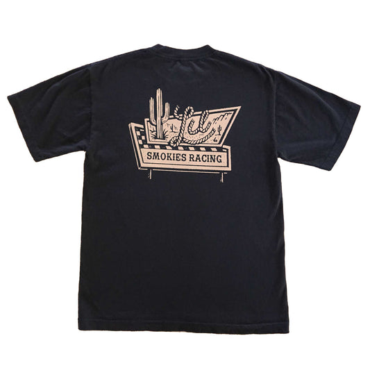 Back image of road sign tee with oversized graphic. Cactus on the left with Lil spelled out in rope design. A throwback to western signs on the highway. 